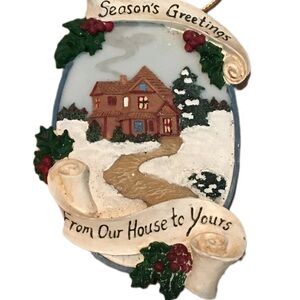 Charming Holiday House Ornament with Festive Accents